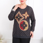 Dámska blúzka s dlhým rukávom a elegantnou ornamentálnou potlačou